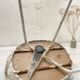 Basket armchair in metal and wood.