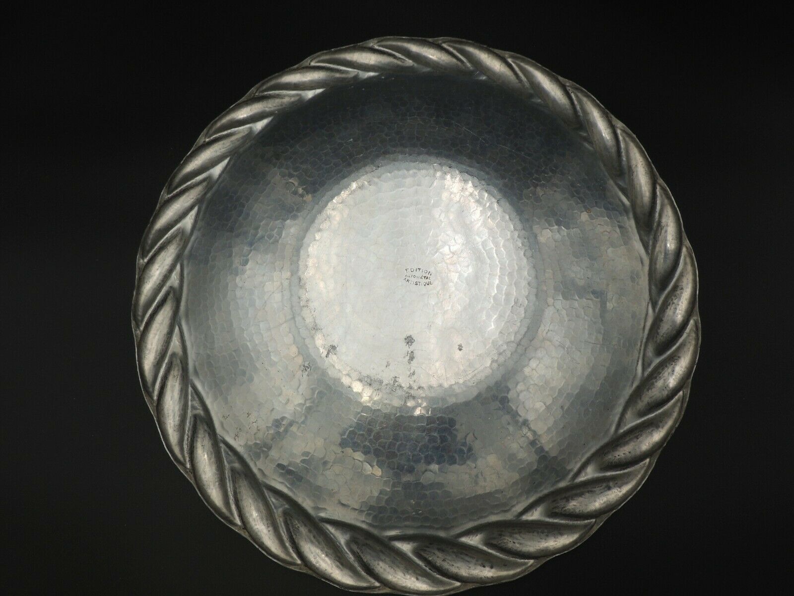 Large stainless steel dish by artistic Irman