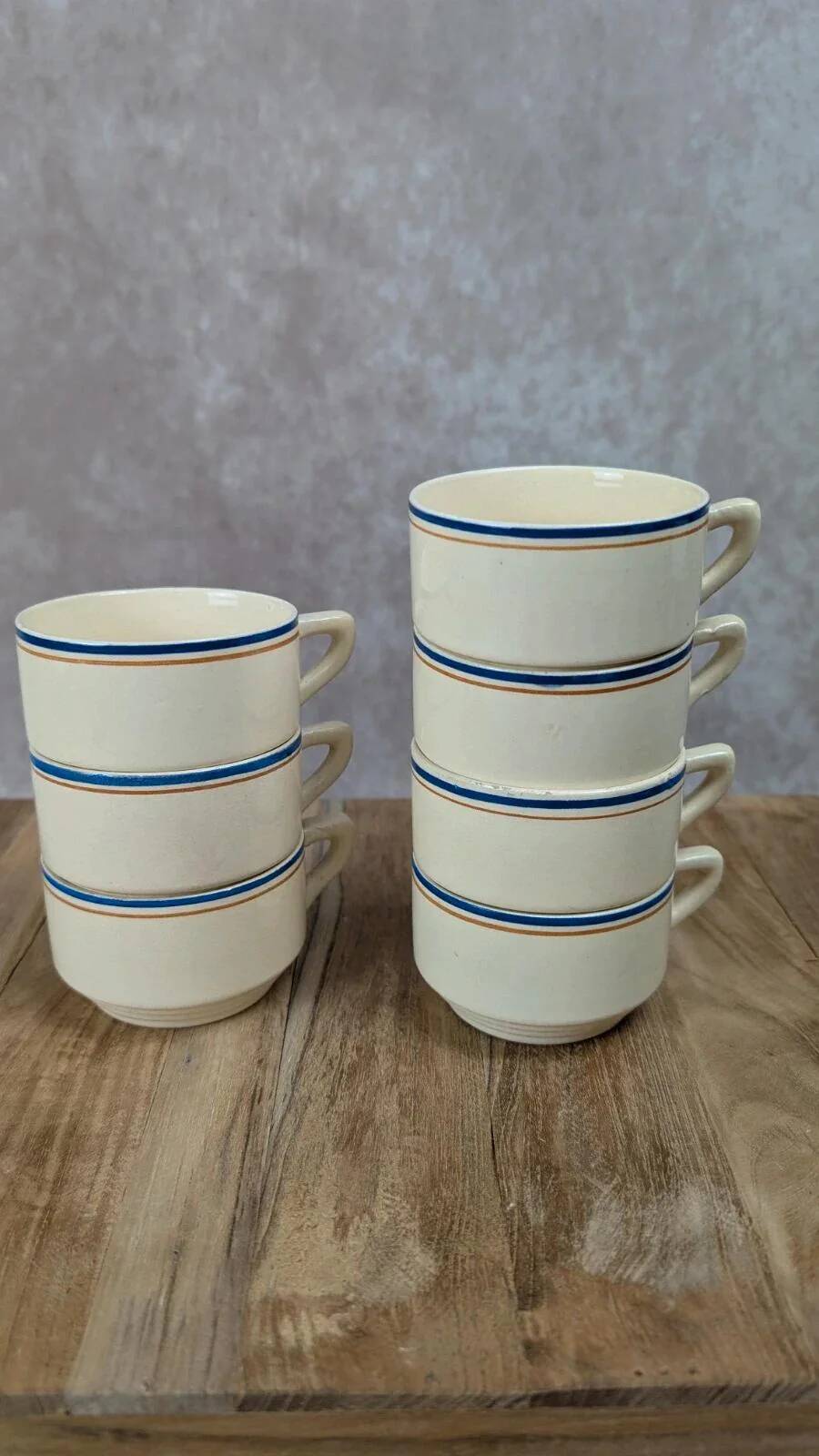 Set of 7 vintage cups Moulin des Loups – Blue and ochre trim, retro charm