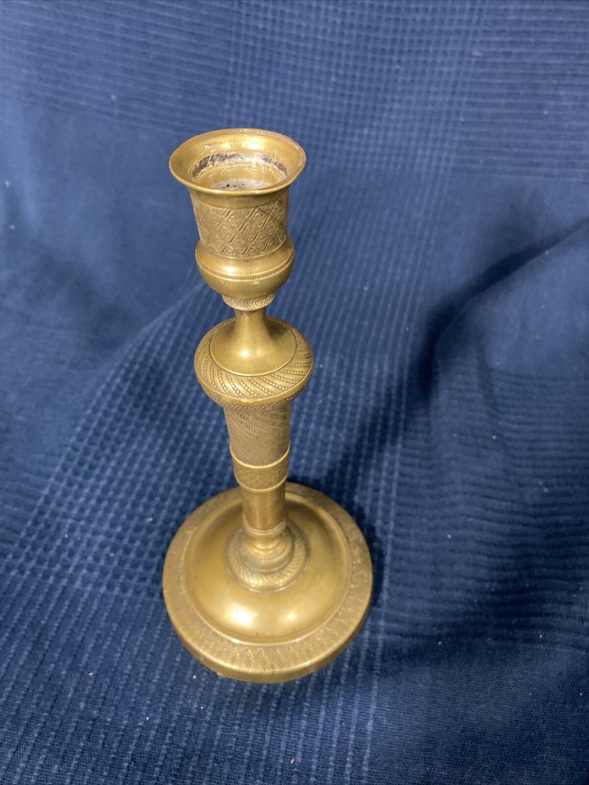 Old Louis-style brass candlestick