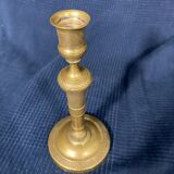 Old Louis-style brass candlestick