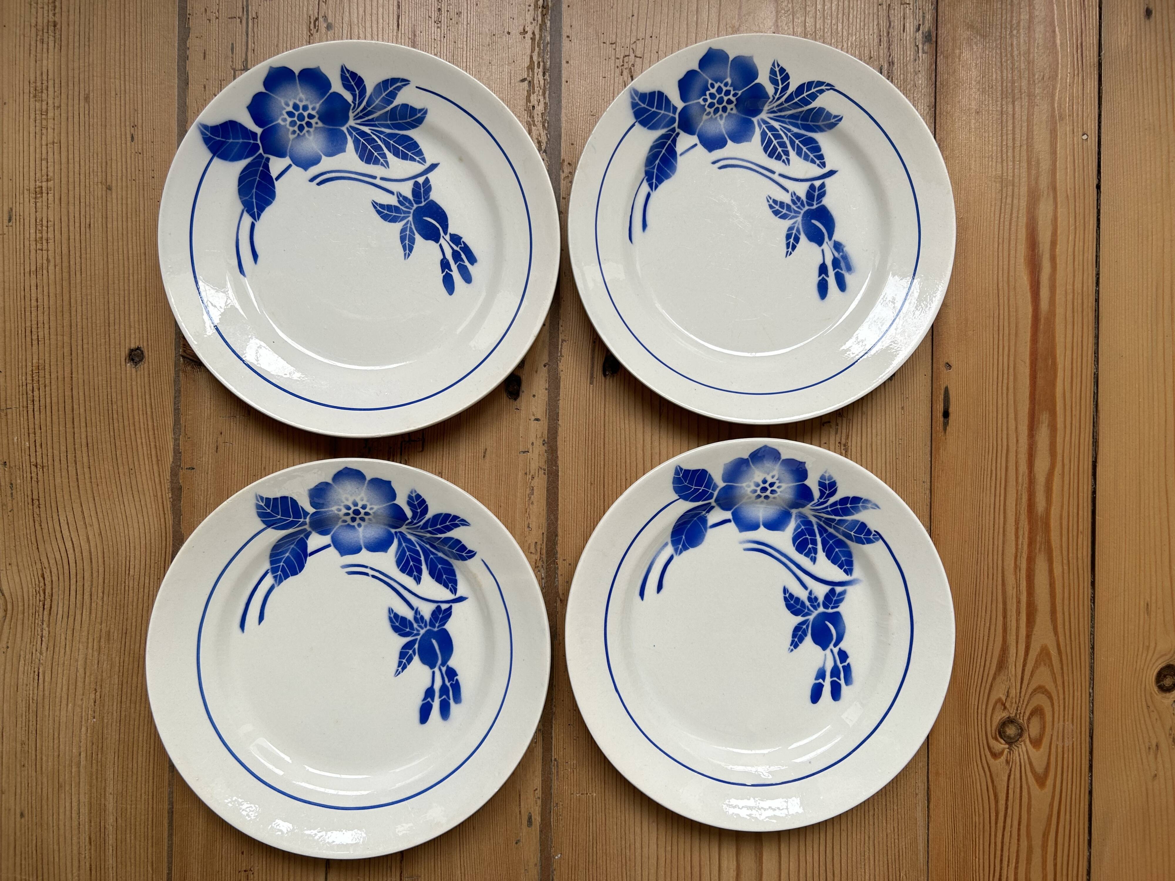 Set of 4 old Limoges flat plates
