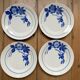 Set of 4 old Limoges flat plates
