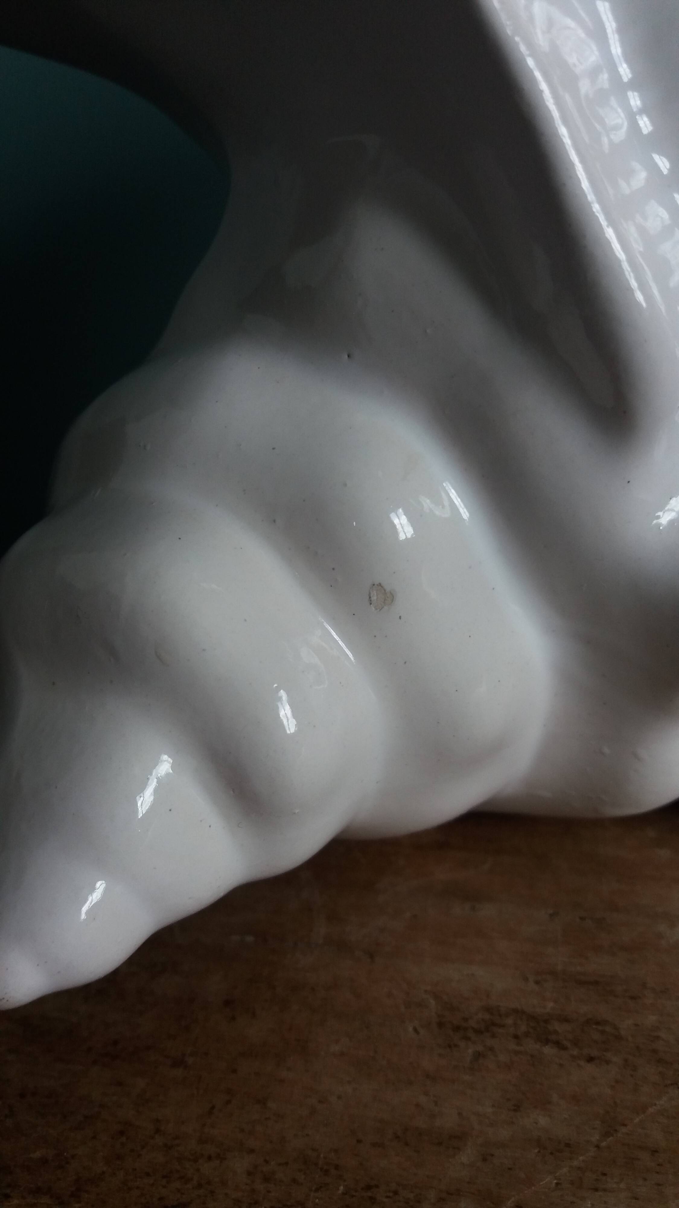 Ceramic conch shell, plant pot or trinket dish.