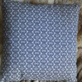 Blue cushion with royal pattern