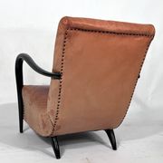Sculptural Italian Mid-century leather and curved wood armchair from 50s