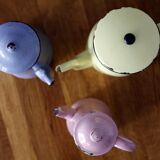Set of old coffee makers in enamelled sheet metal