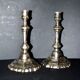 Pair of antique octagonal candlesticks in silvered bronze, Regency style.