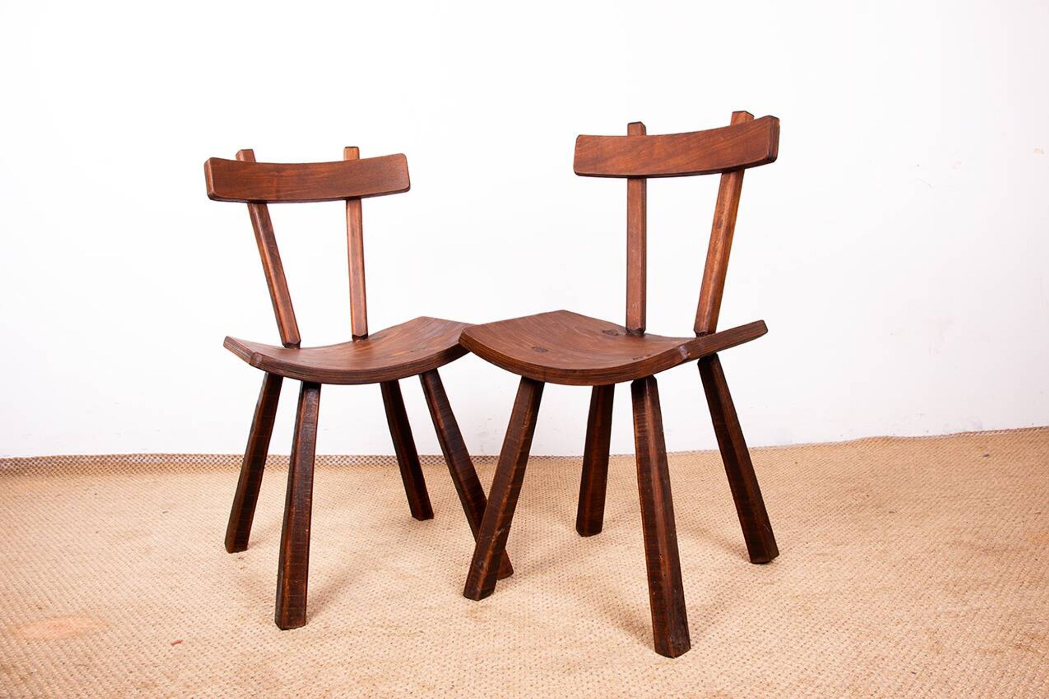 Brutalist pair of chairs in Elm in the style of Jean Touret 1950.