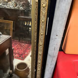 Large antique gilt mirror with scroll and shell decoration, 144 cm