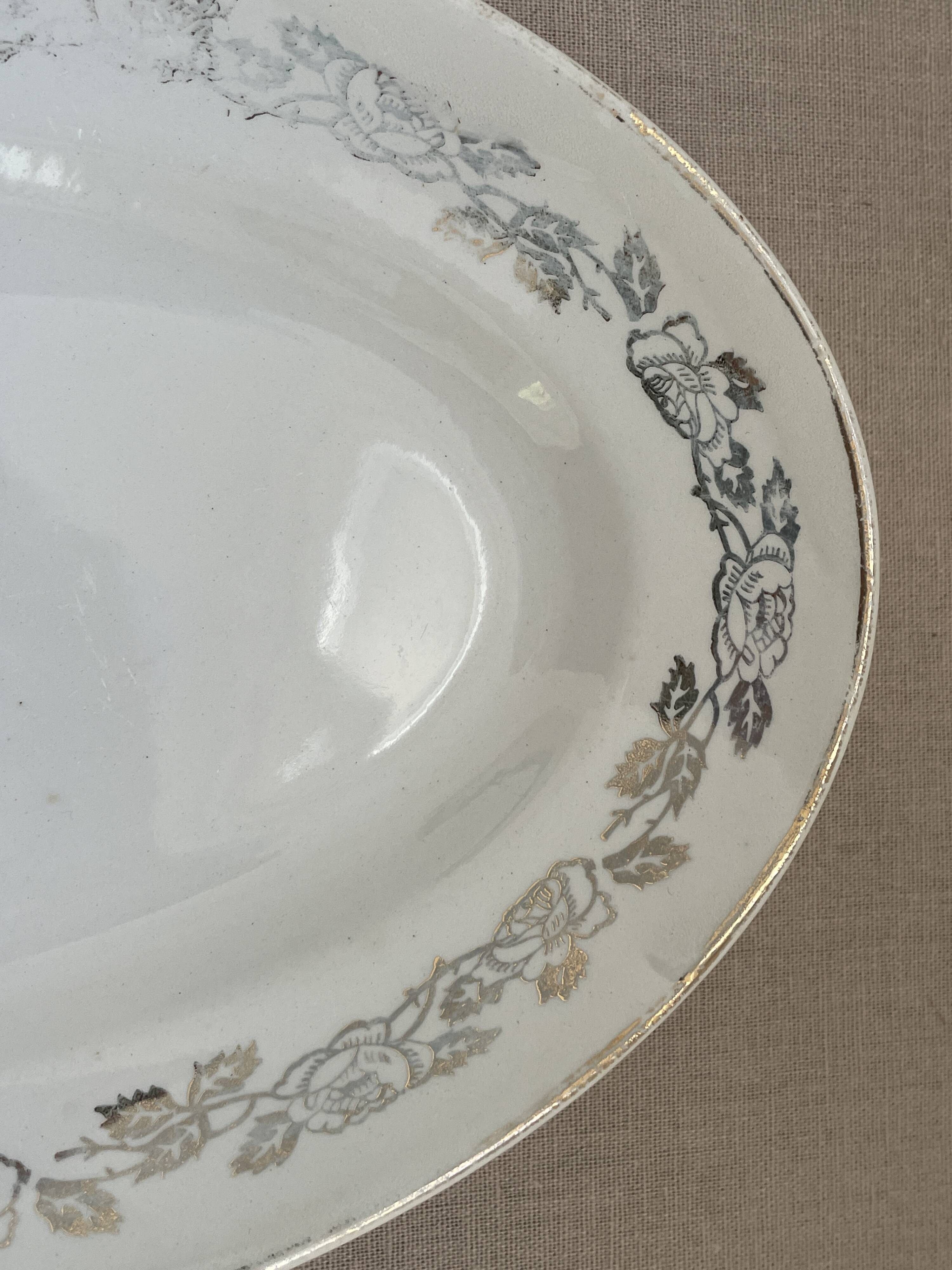 Antique oval plate Moulin des Loups Orchies – grey and gold floral decoration
