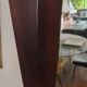 Grand miroir mural en bois exotique massif