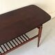 Danish teak coffee table with a double top, 1950s design.
