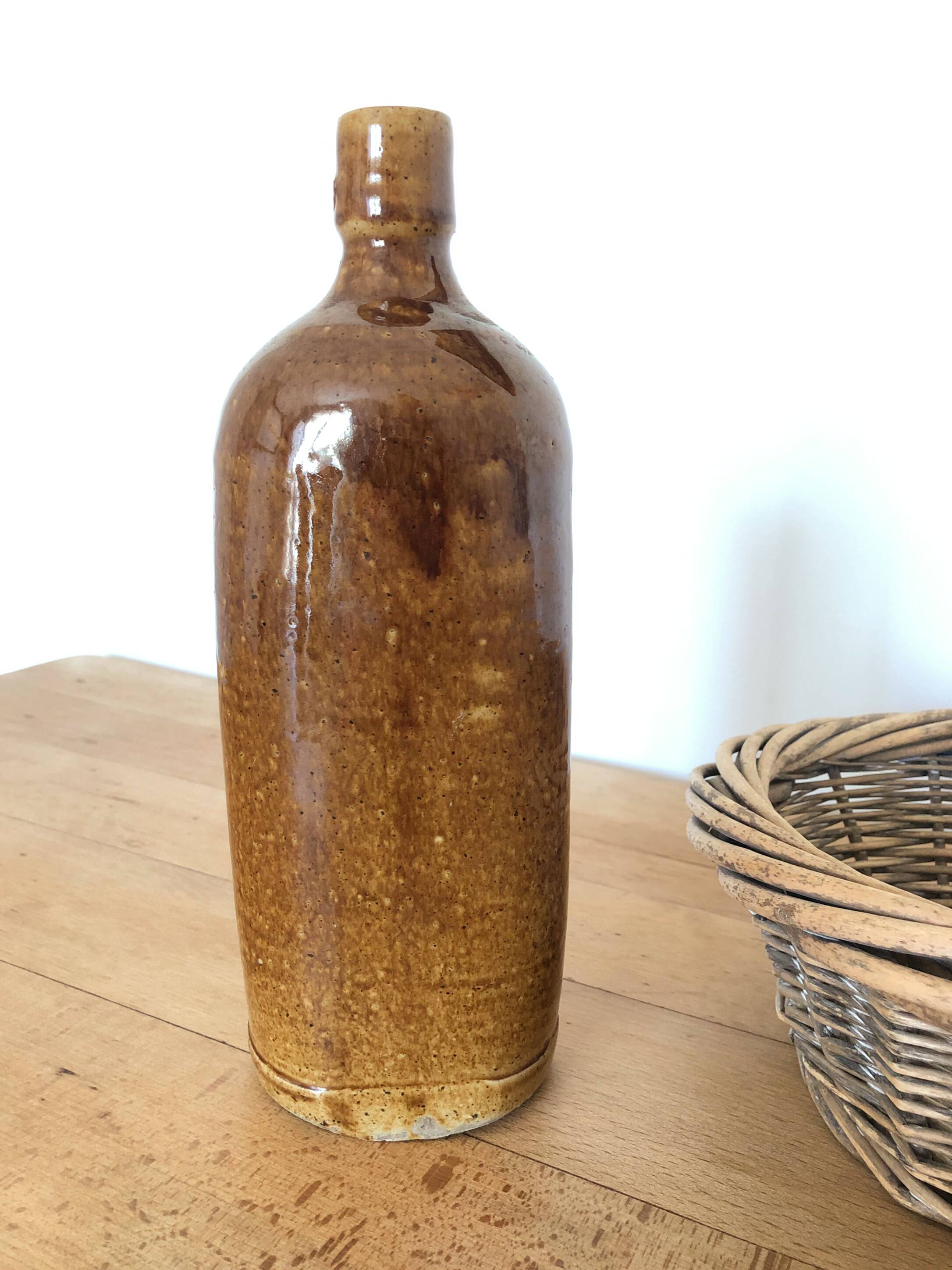 Set of 5 antique glazed stoneware bottles