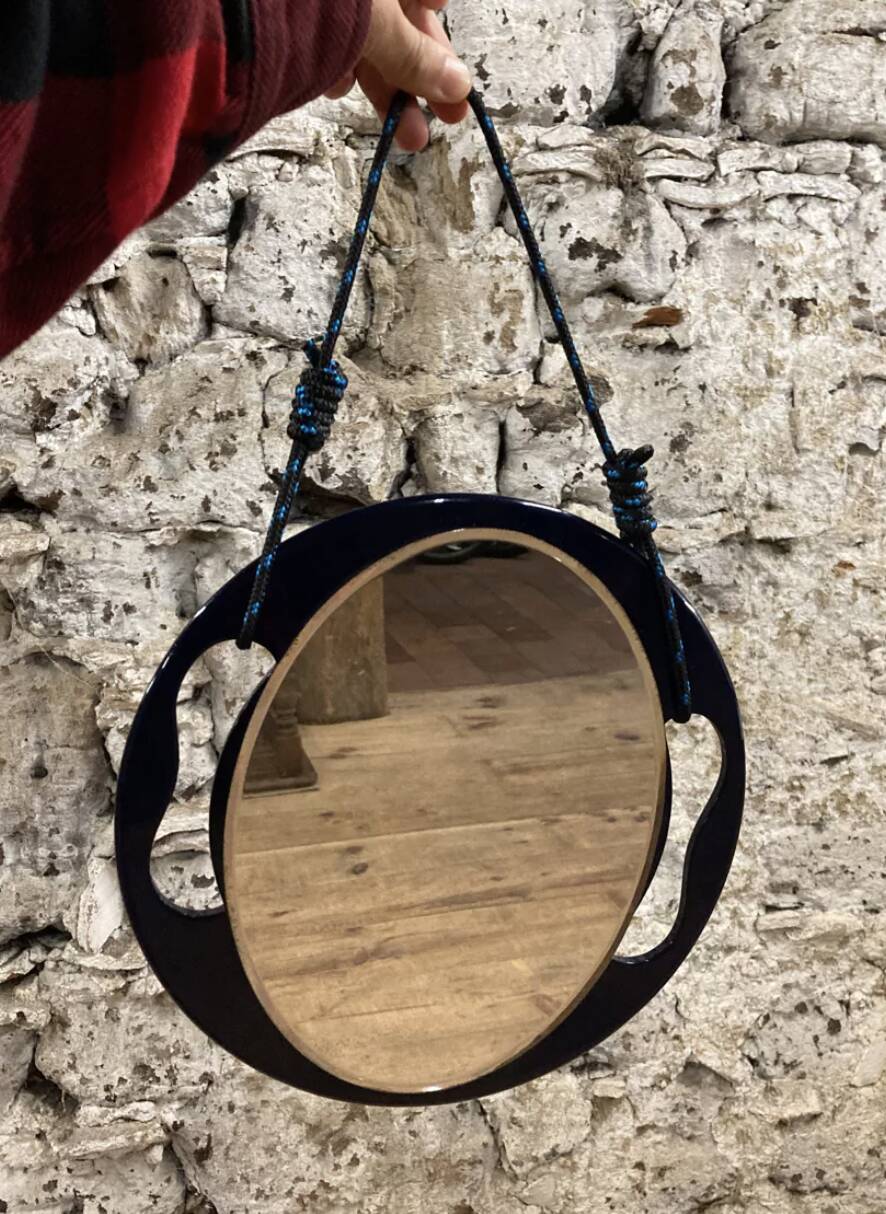 Small round wall mirror in dark blue bakelite 1960