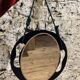 Small round wall mirror in dark blue bakelite 1960