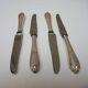 4 anciens couteaux de table en inox Grossmann
