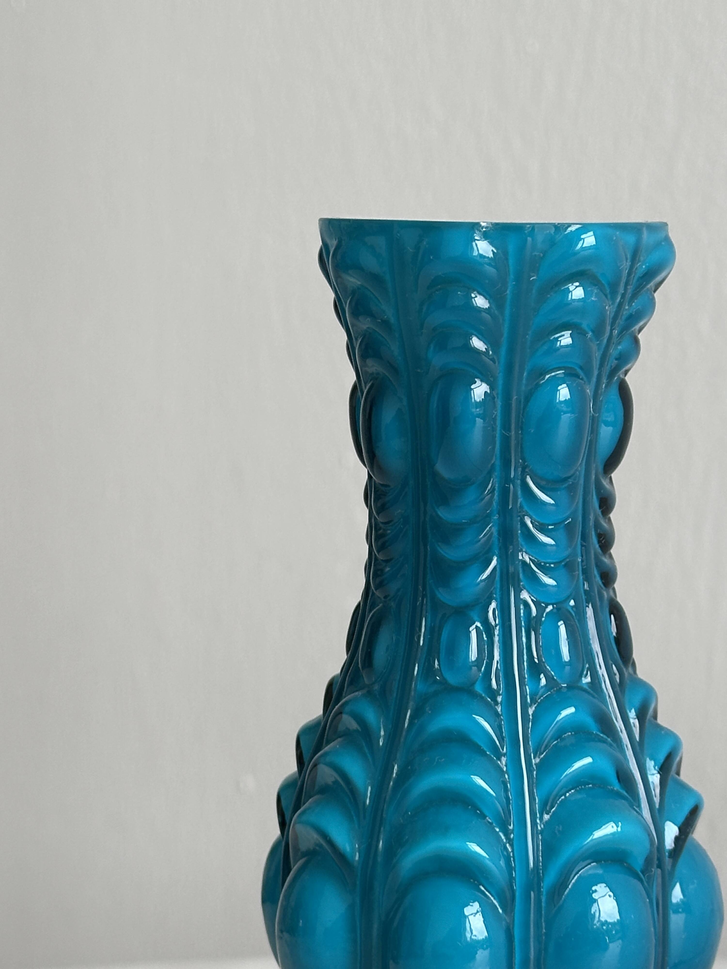 Small deep blue vase with reliefs