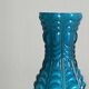 Small deep blue vase with reliefs