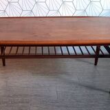 Danish 1960s teak coffee table with slatted shelf.