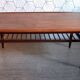 Danish 1960s teak coffee table with slatted shelf.