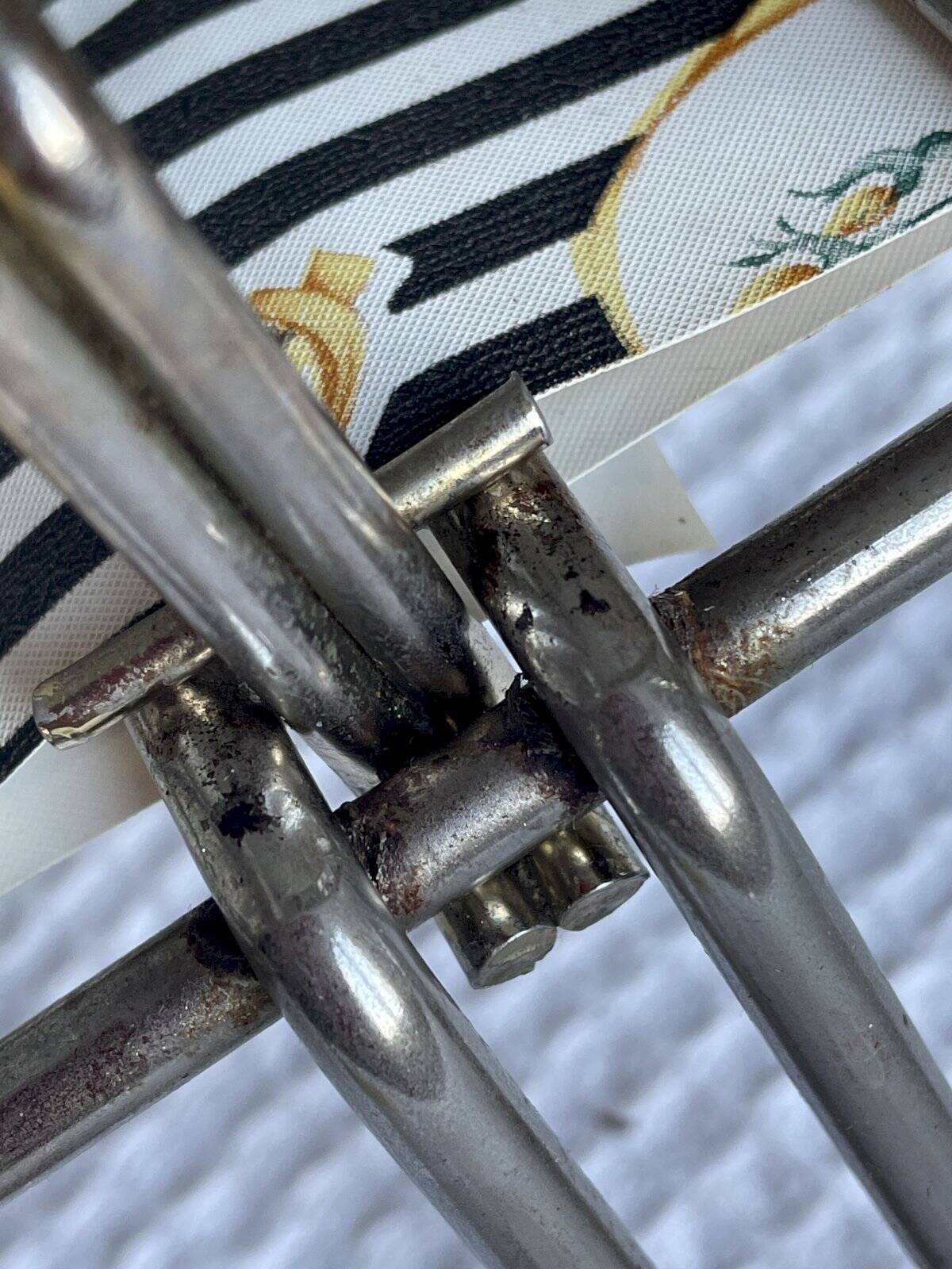 Vintage metal and plastic-coated fabric magazine rack