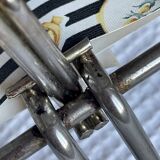 Vintage metal and plastic-coated fabric magazine rack