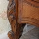 Walnut rocaille bed from the early 20th century.