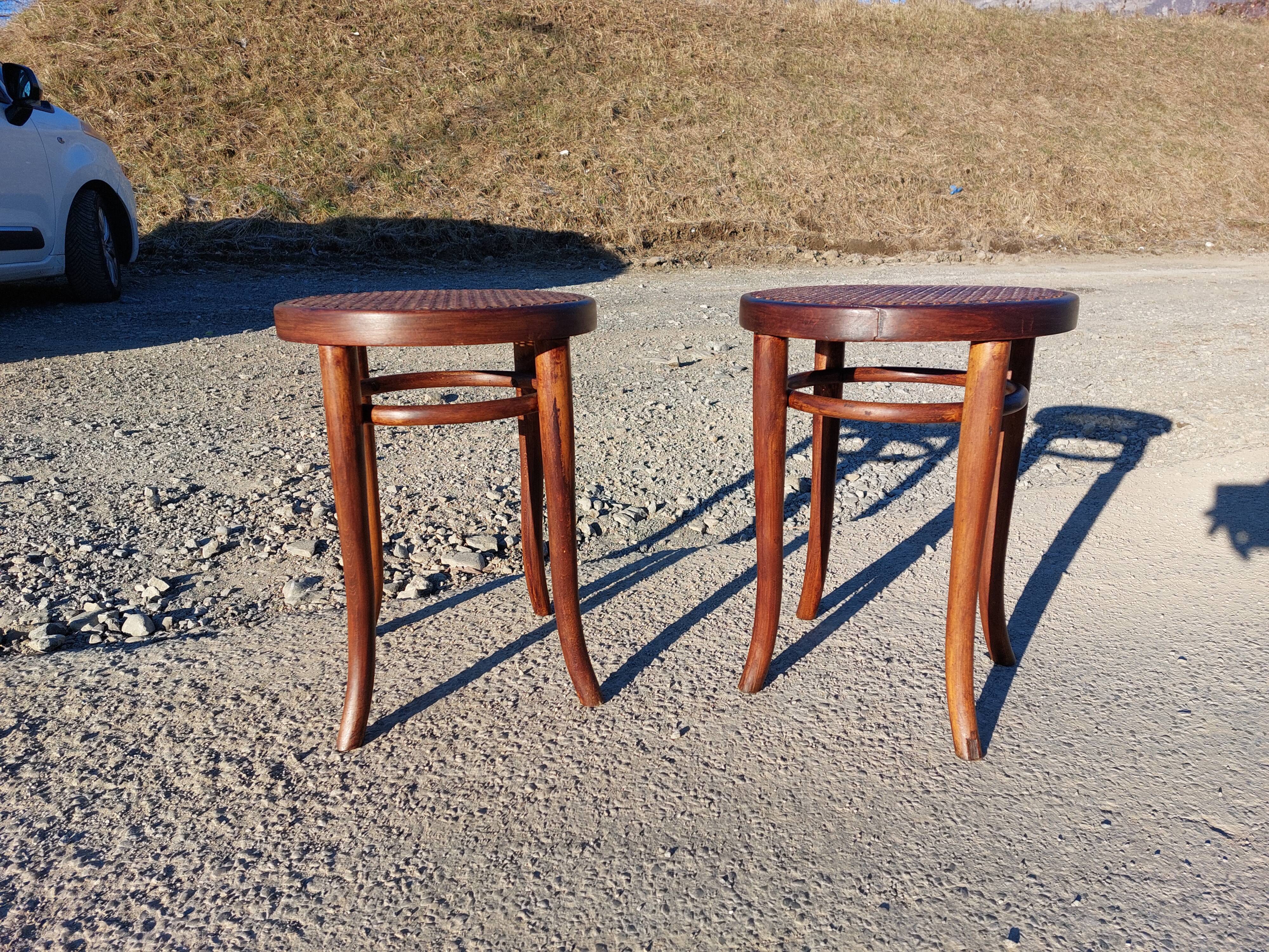 Pair of low caned stools signed Thonet - 1920s