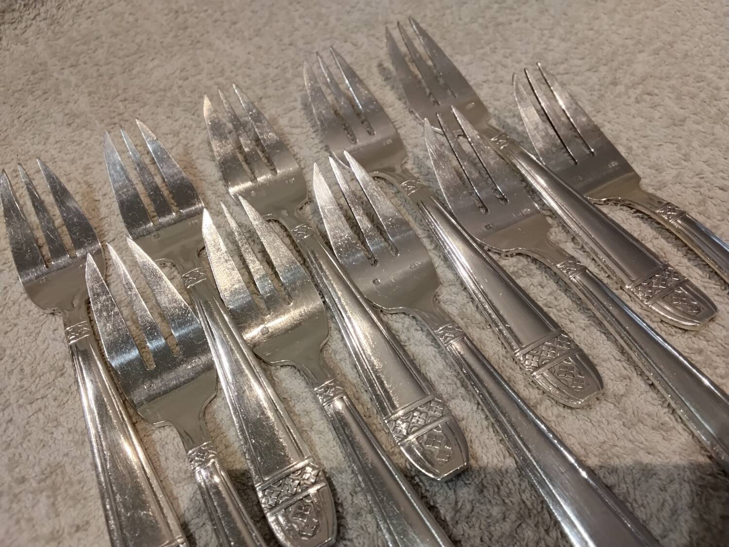 10 silver-plated metal cake forks from the Monaco Grand Prix