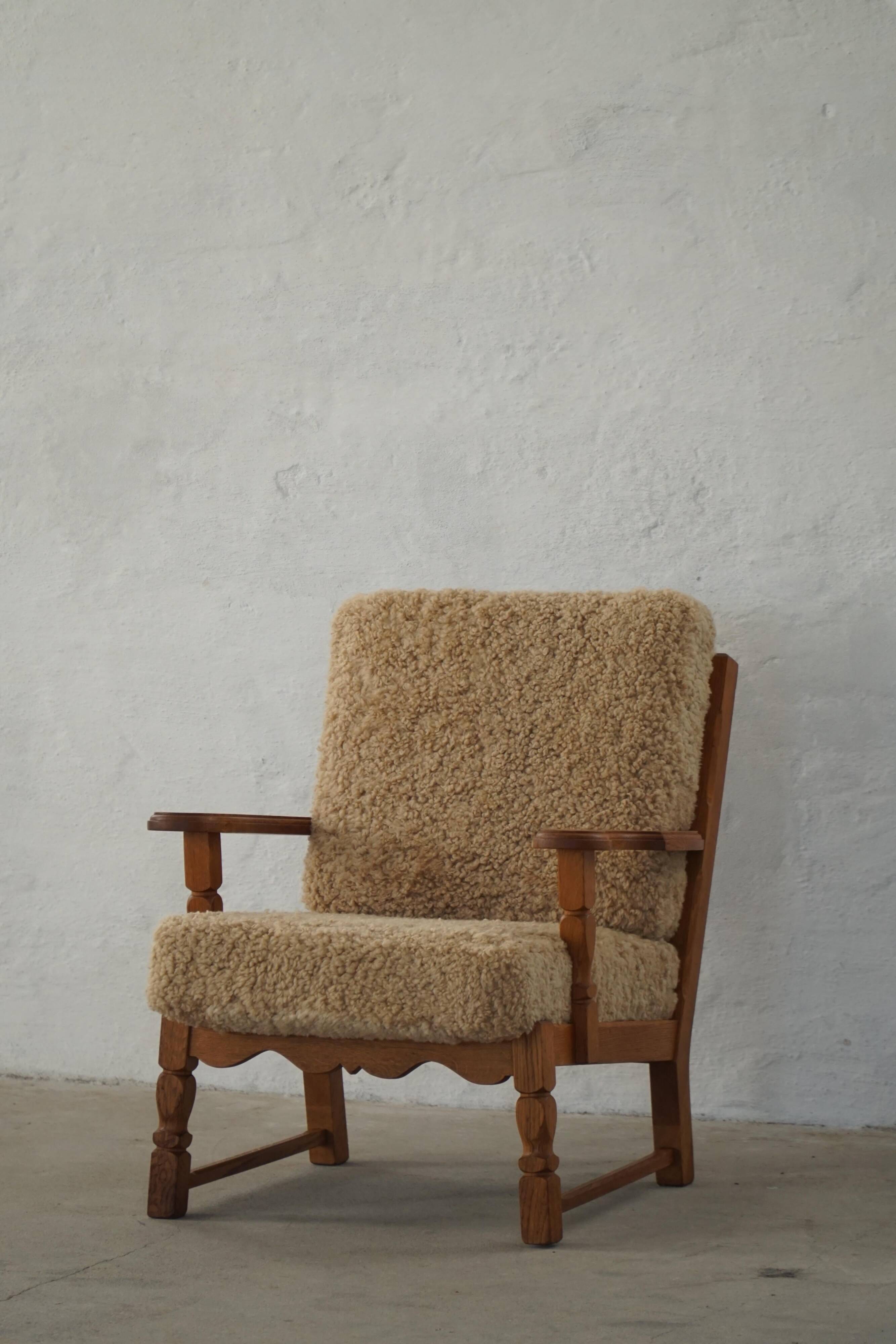 Danish modernist lounge chair in oak and lambswool, Henning Kjærnulf, 1960s