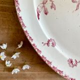 Old oval dish in iron earth