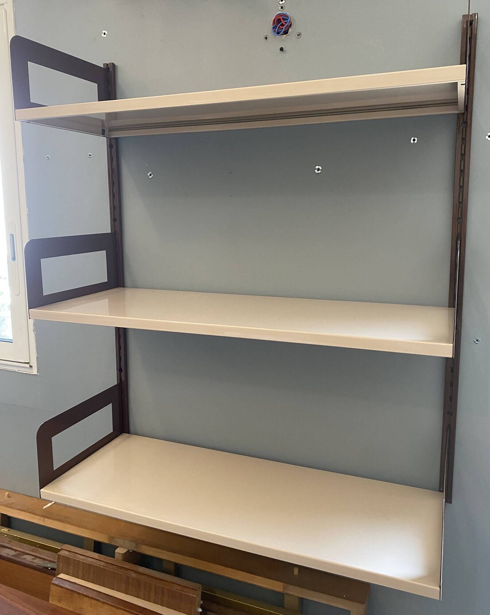 Modular metal wall shelf in brown and beige vintage 70s design.