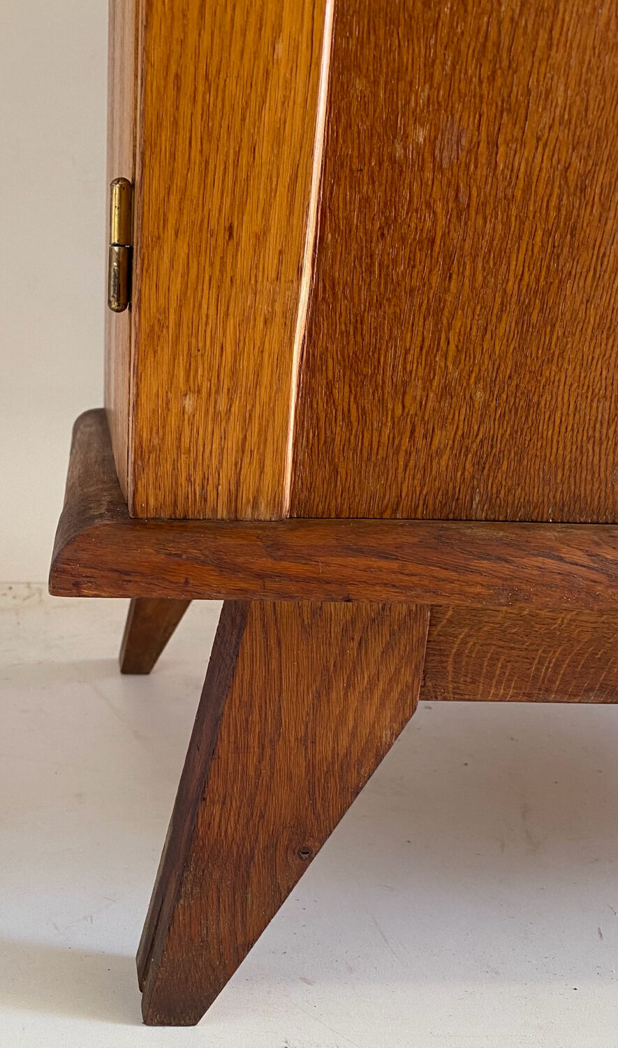 Vintage cupboard with compass feet