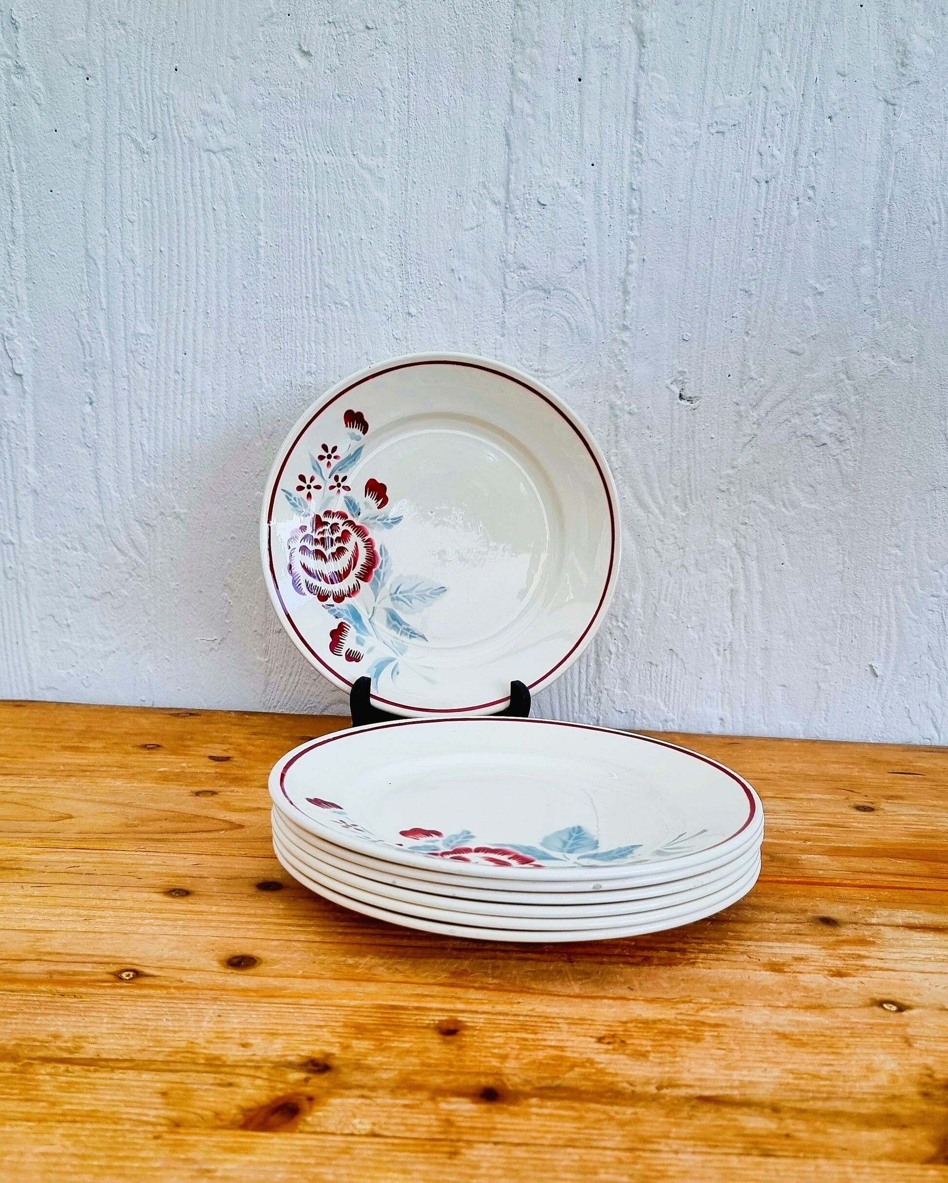 Set of 7 Badonviller Antibes plates with vintage floral decoration.