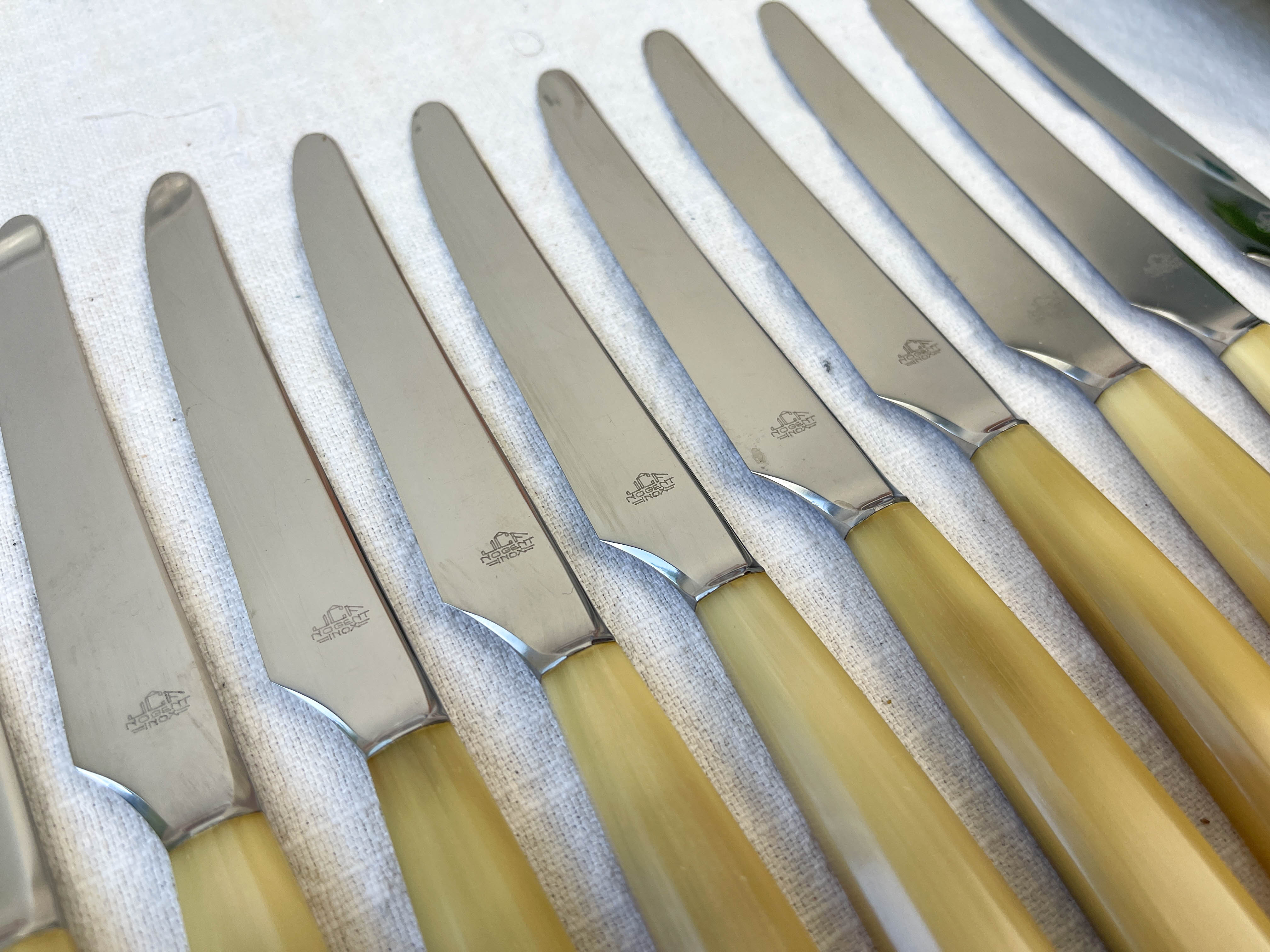 12 vintage knives NOGENT Bakélite imitation ivory