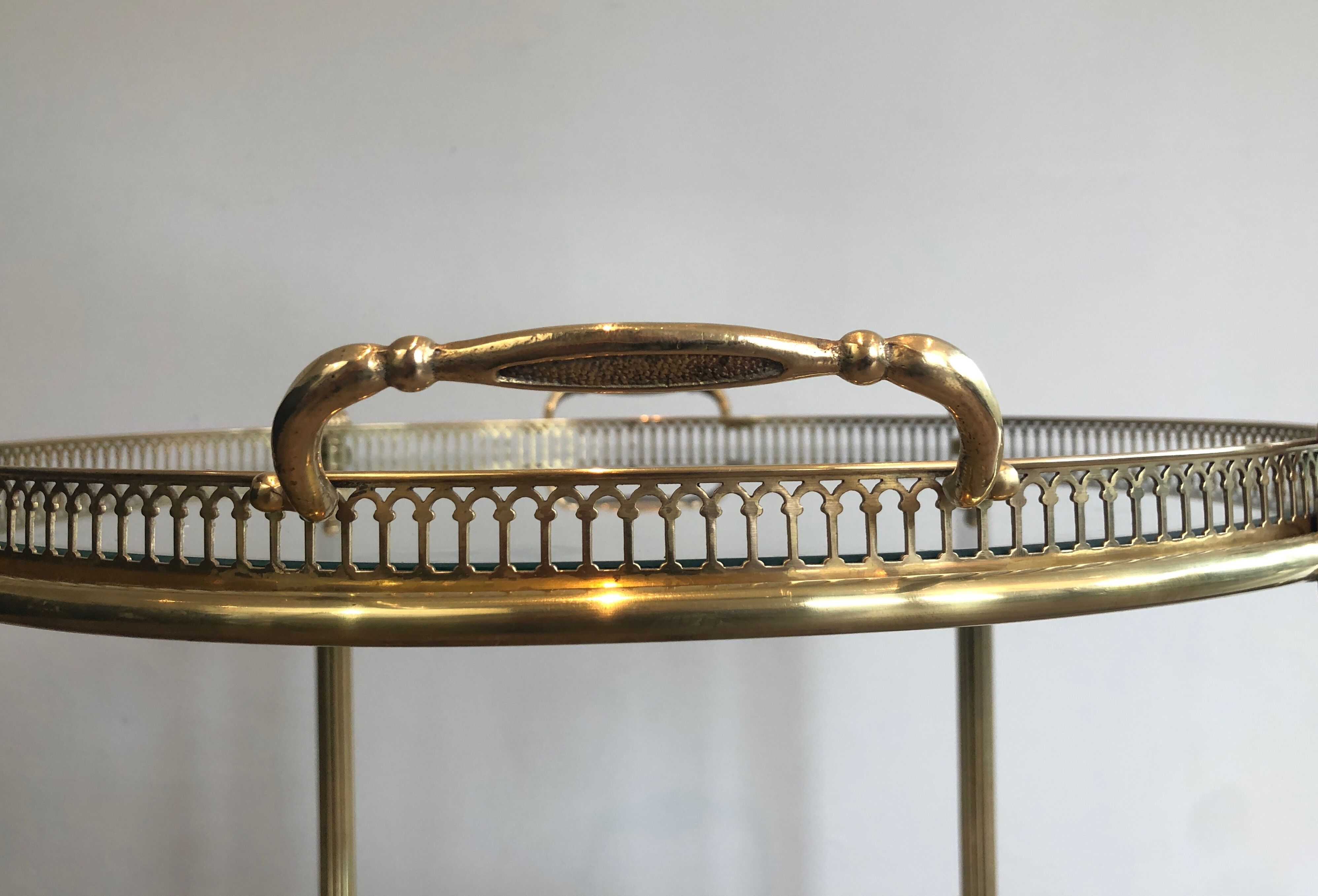 Neoclassical style rolling table in brass