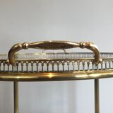 Neoclassical style rolling table in brass