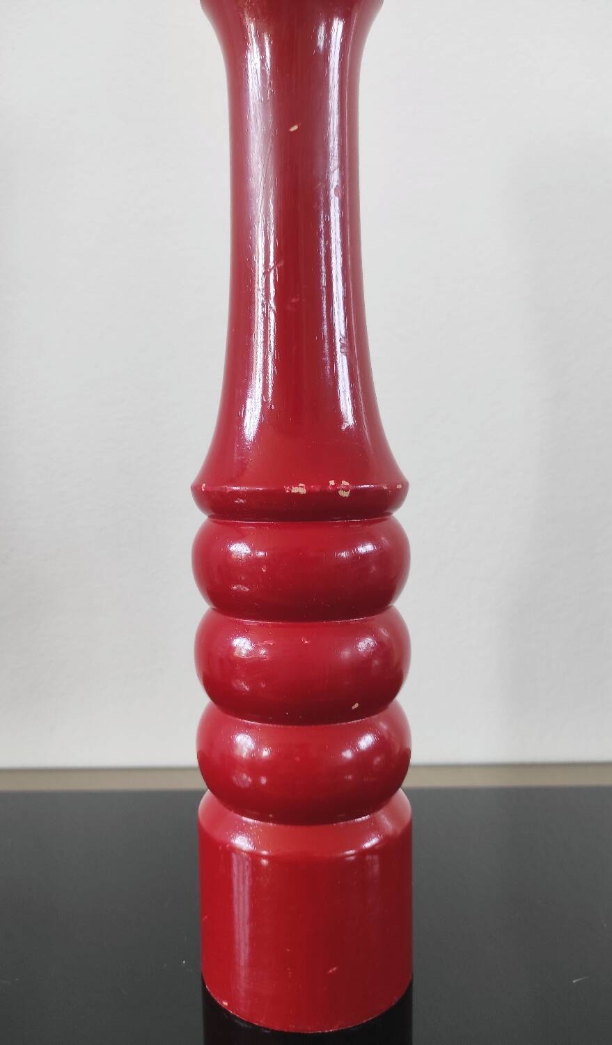 Giant vintage red lacquered wooden pepper mill