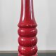 Giant vintage red lacquered wooden pepper mill