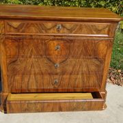 Walnut and walnut burl commode in Louis Philippe style.