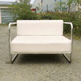 Chrome-designed chair and faux white leather 1970