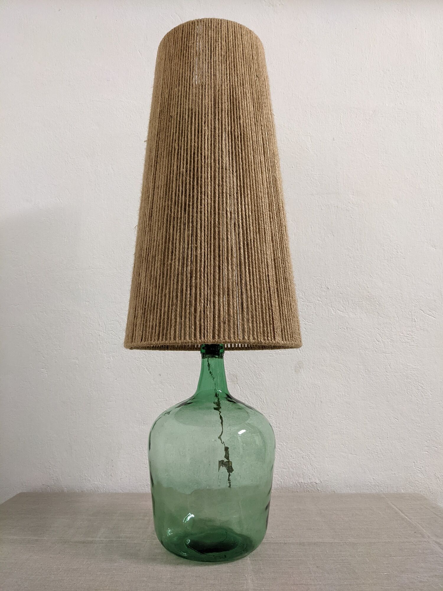Vintage demijohn lamp in glass and XXL jute rope