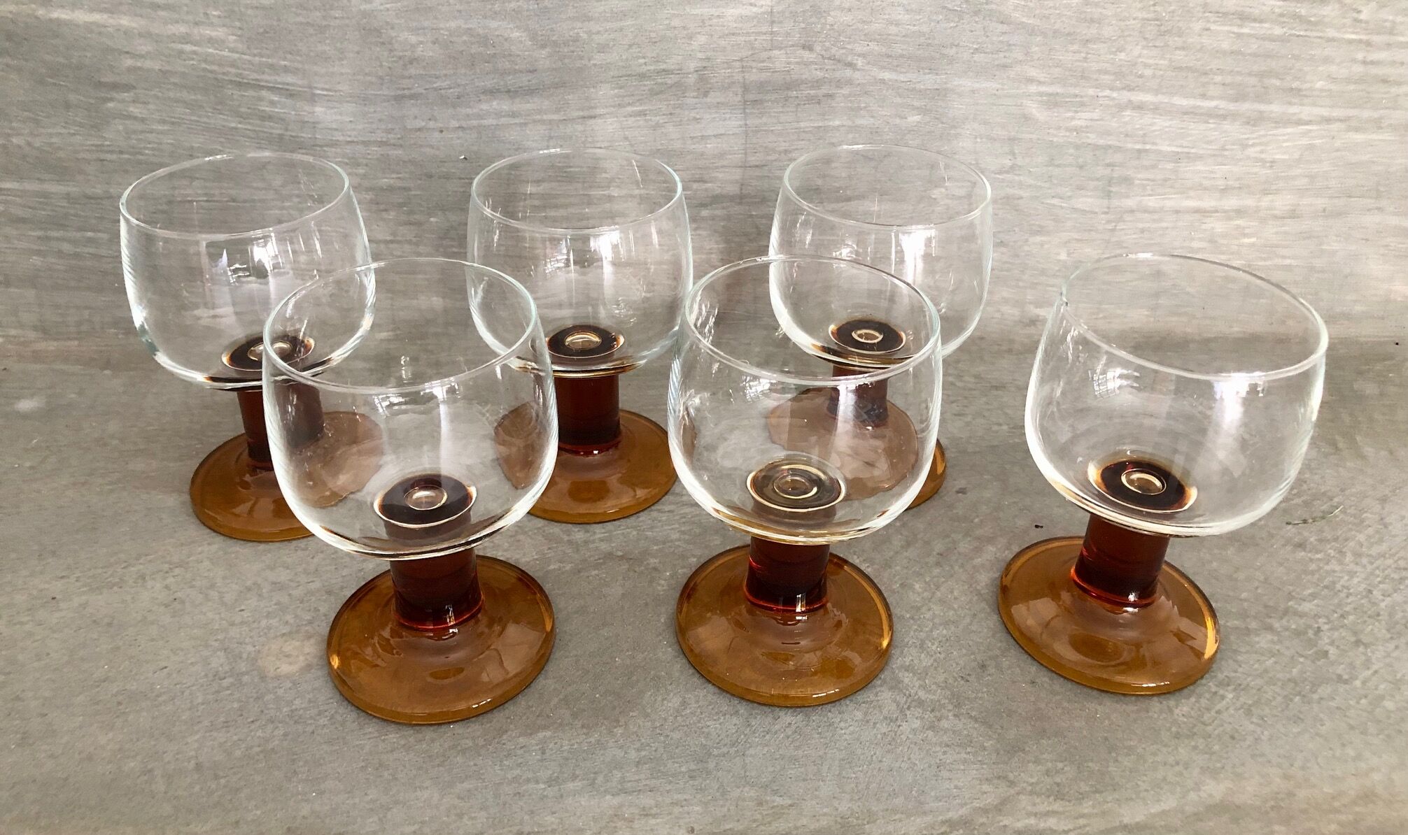 6 Amber stemmed glasses an'70