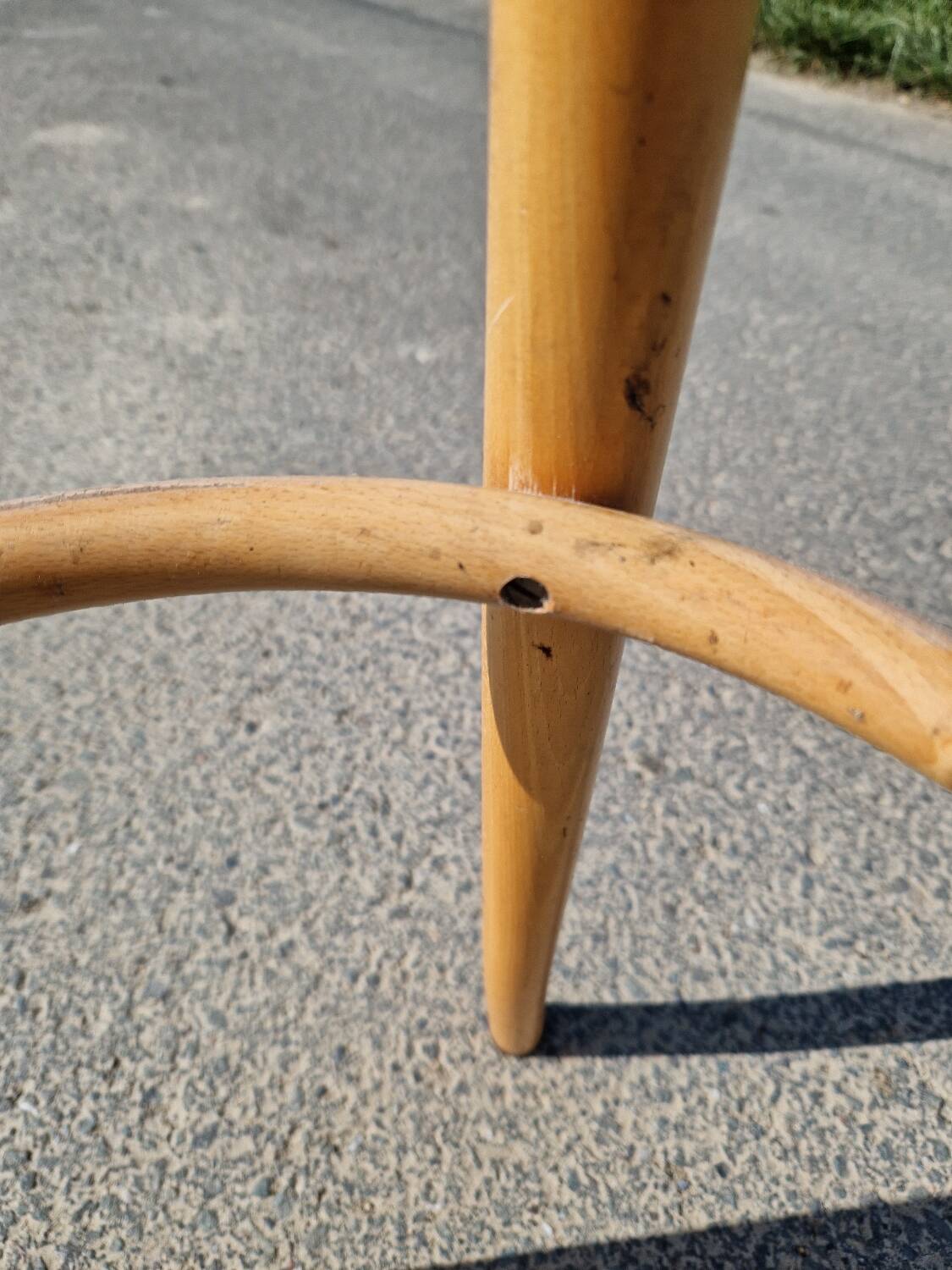 High bar stool in curved wood and cane
