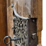 Antique oak door with frame and pierced wrought-iron lock – 16th–17th c.