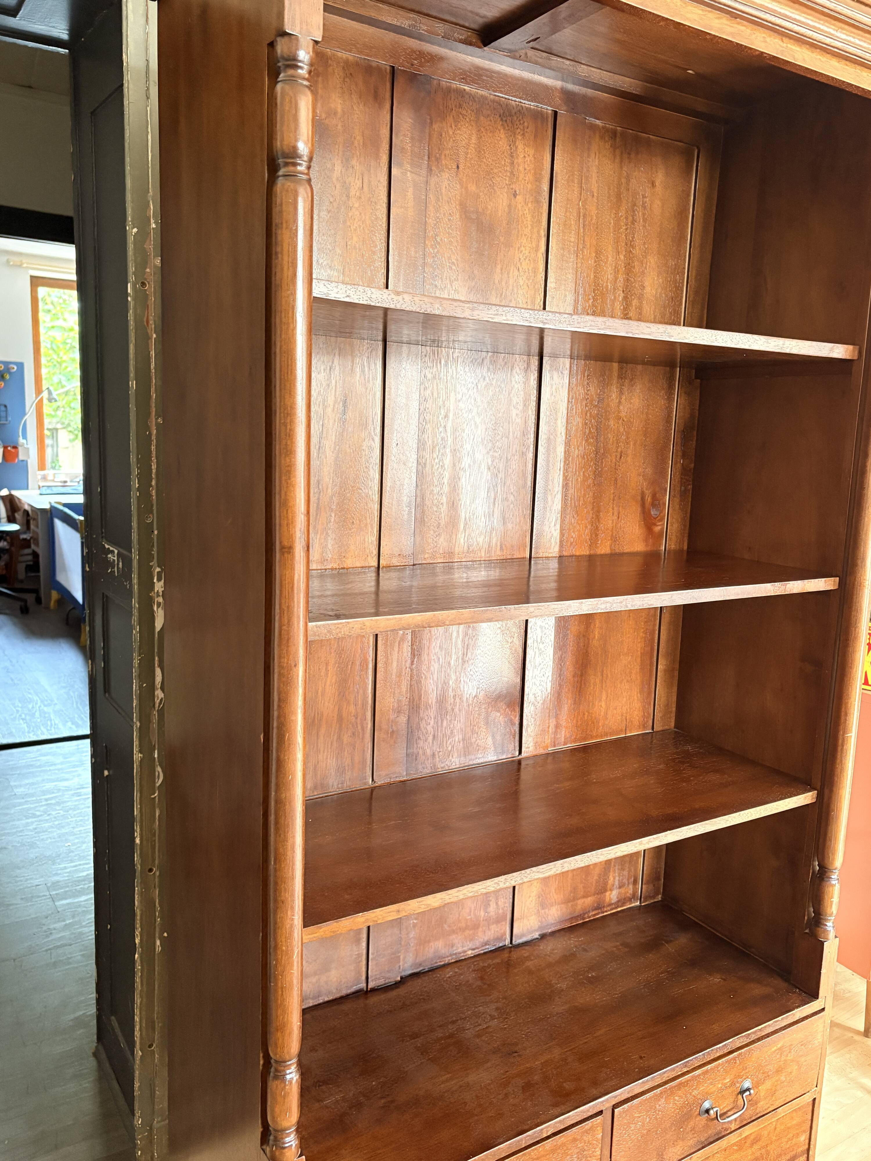 Wooden bookshelf with drawer