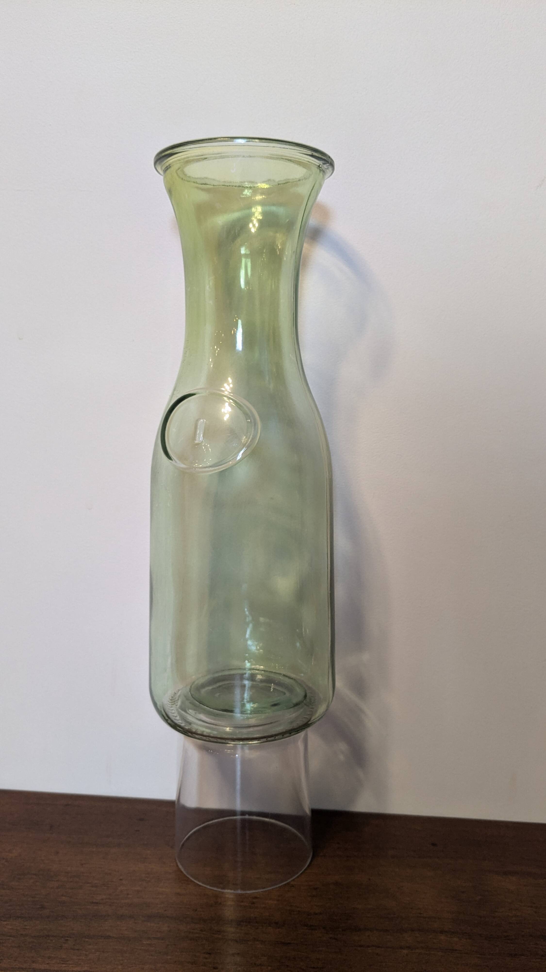 Old green milk bottle