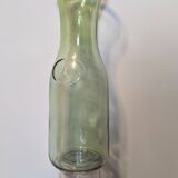 Old green milk bottle