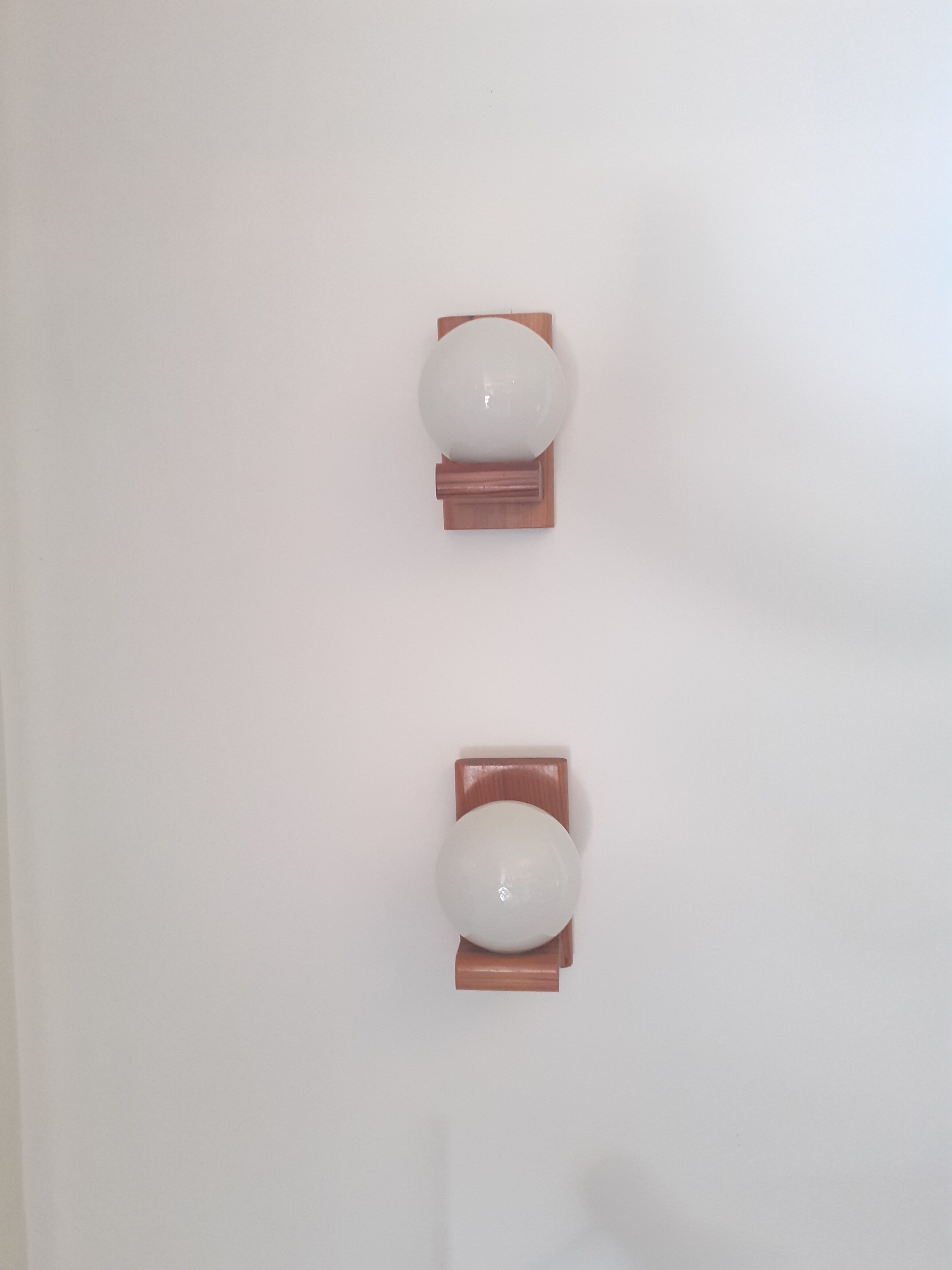 Pair of sconces in solid pine and white opaline